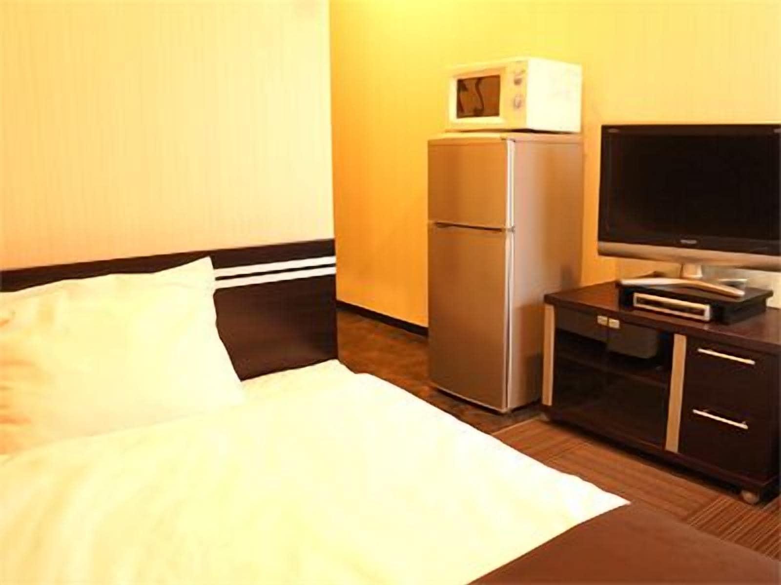Hotel Livemax Budget Esaka Suita Buitenkant foto