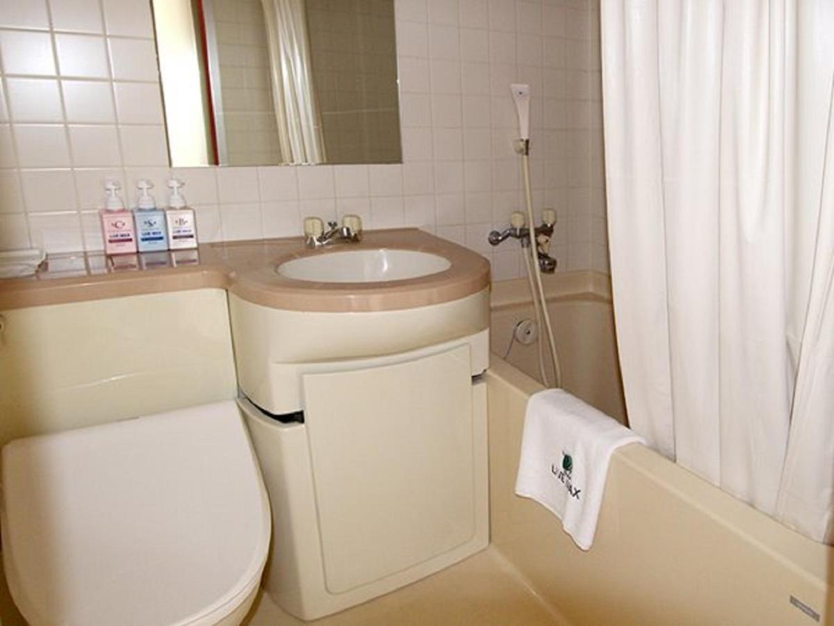 Hotel Livemax Budget Esaka Suita Buitenkant foto