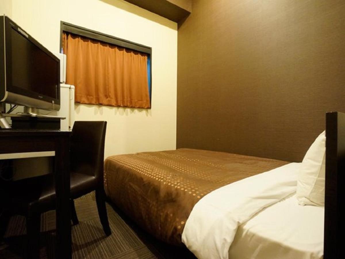 Hotel Livemax Budget Esaka Suita Buitenkant foto
